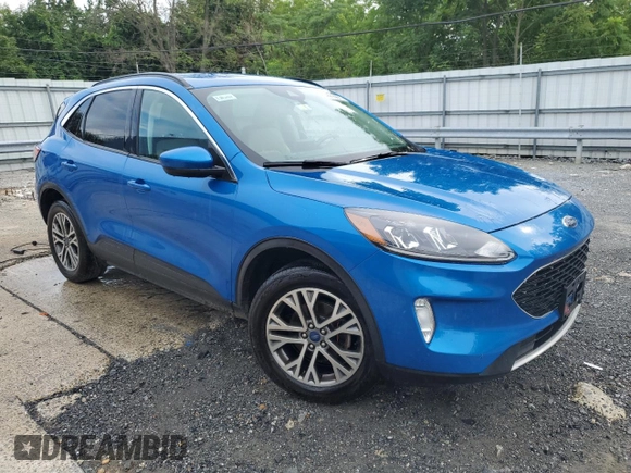 2021 Ford Escape SEL z VIN 1FMCU9H61MUA65237, wystawiony jako Copart lot #65338735 z przebiegiem 92 741 mil mil oraz Czysty tytuł • Clean title. Historia ofert i sprzedaży dostępna na DreamBid. Obrazek 4.