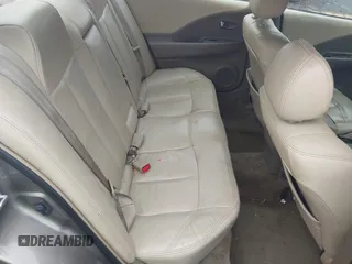 2002 Nissan Altima SL z VIN 1N4AL11D92C294136, wystawiony jako IAAI lot #42342860 z przebiegiem 220 080 mil mil oraz . Historia ofert i sprzedaży dostępna na DreamBid. Obrazek 8.