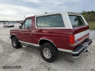 1990 Ford Bronco Custom with VIN 1FMEU15H2LLA70449, listed as a Copart auction lot 77953604 with 12,519 mi miles and Salvage Title. Bid and sale history available at carsss.com. Image 2.