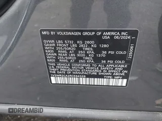 2024 Volkswagen Atlas SE z VIN 1V2WR2CA2RC594326, wystawiony jako IAAI lot #41471154 z przebiegiem 1 610 mil mil oraz . Historia ofert i sprzedaży dostępna na DreamBid. Obrazek 9.