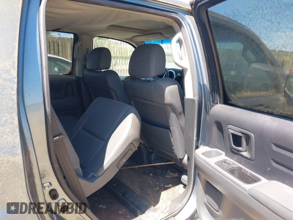2007 Honda Ridgeline RTL z VIN 2HJYK16527H541865, wystawiony jako IAAI lot #42550602 z przebiegiem 160 703 mil mil oraz . Historia ofert i sprzedaży dostępna na DreamBid. Obrazek 8.