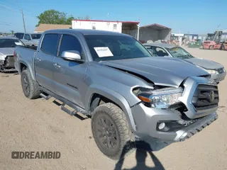 2023 Toyota Tacoma SR5 z VIN 3TMAZ5CN1PM211066, wystawiony jako IAAI lot #41902847 z przebiegiem 23 684 mil mil oraz . Historia ofert i sprzedaży dostępna na DreamBid. Obrazek 1.