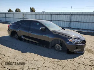 2018 Nissan Maxima SR with VIN 1N4AA6AP9JC371440, listed as a Copart auction lot 75309784 with 68,459 mi miles and Salvage Title. Bid and sale history available at carsss.com. Image 4.