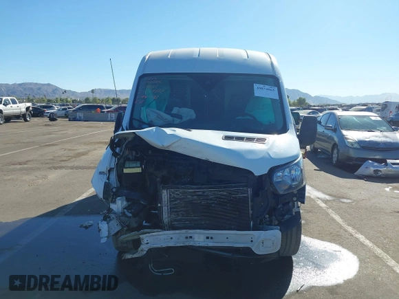 2018 Ford Transit with VIN 1FTYE1CMXJKB41091, listed as a IAAI auction lot 40874065 with 94,246 mi miles and . Bid and sale history available at DreamBid. Image 12.