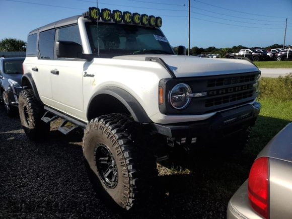 2022 Ford Bronco with VIN 1FMEE5BP4NLB45977, listed as a Copart auction lot 74874914 with 13,719 mi miles and Salvage Title. Bid and sale history available at DreamBid. Image 4.