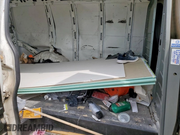 2010 Chevrolet Express Cargo with VIN 1GCUGADX1A1172060, listed as a Copart auction lot 58779905 with 456,288 mi miles and Salvage title. Bid and sale history available at DreamBid. Image 10.