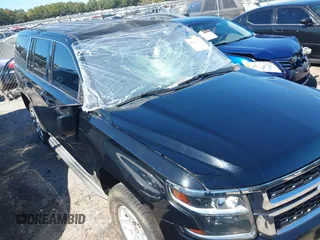 2015 Chevrolet Tahoe Commercial with VIN 1GNLC2EC3FR280365, listed as a IAAI auction lot 40580594 with 195,740 mi miles and . Bid and sale history available at DreamBid. Image 6.