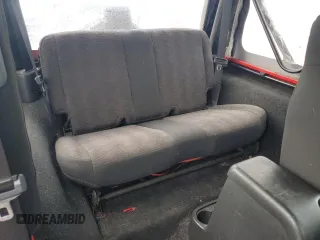 2005 Jeep Wrangler X z VIN 1J4FA39S15P337816, wystawiony jako Copart lot #55957725 z przebiegiem 107 030 mil mil oraz Szkoda całkowita • Salvage title. Historia ofert i sprzedaży dostępna na DreamBid. Obrazek 10.