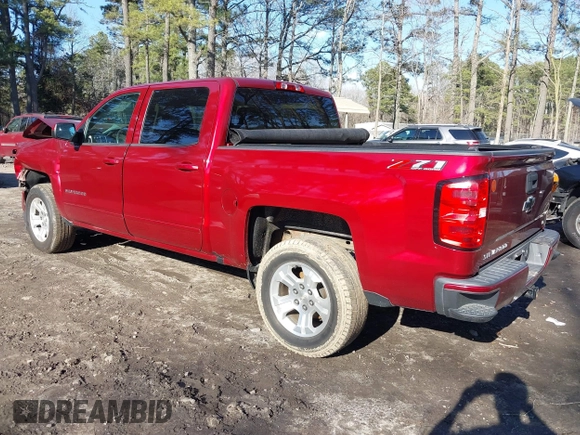 2018 Chevrolet Silverado 1500 LT with VIN 3GCUKREC4JG204672, listed as a IAAI auction lot 41638941 with 134,506 mi miles. Bid and sale history available at carsss.com. Image 3.