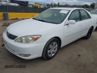 2004 Toyota Camry LE with VIN 4T1BF30K74U073676, listed as a IAAI auction lot 41668460 with 249,847 mi miles. Bid and sale history available at carsss.com. Image 2.