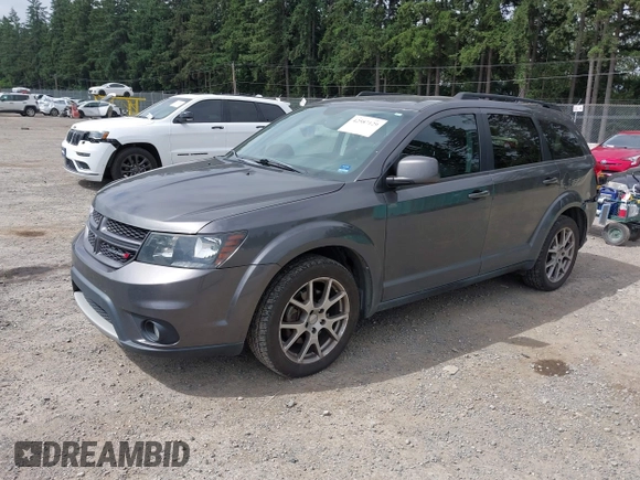 2015 Dodge Journey R/T with VIN 3C4PDCEG8FT686925, listed as a IAAI auction lot 42587129 with 167,723 mi miles and . Bid and sale history available at DreamBid. Image 2.