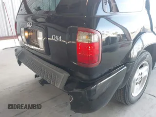 2002 Infiniti QX4 with VIN JNRDR09XX2W212458, listed as a IAAI auction lot 41770184 with 208,441 mi miles and . Bid and sale history available at DreamBid. Image 6.