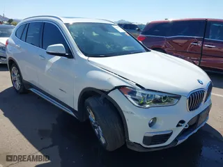 2017 BMW X1 xDrive28i with VIN WBXHT3C30H5F68187, listed as a IAAI auction lot 41830892 with 101,313 mi miles. Bid and sale history available at carsss.com. Image 6.