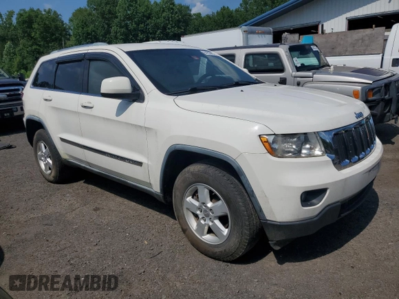 2011 Jeep Grand Cherokee Laredo with VIN 1J4RR4GG8BC572470, listed as a Copart auction lot 64953985 with 171,777 mi miles and Clean title. Bid and sale history available at DreamBid. Image 4.