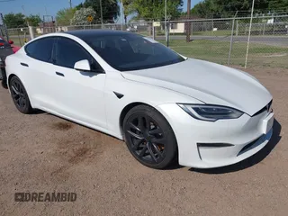 2022 Tesla Model S z VIN 5YJSA1E59NF470813, wystawiony jako IAAI lot #41935297 z przebiegiem Nie podano mil oraz . Historia ofert i sprzedaży dostępna na DreamBid. Obrazek 1.