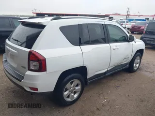 2014 Jeep Compass High Altitude with VIN 1C4NJCEAXED715454, listed as a IAAI auction lot 41960428 with 117,023 mi miles. Bid and sale history available at carsss.com. Image 4.