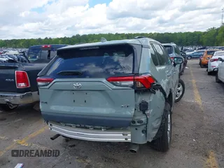 2019 Toyota RAV4 XLE with VIN 2T3W1RFV3KW056351, listed as a IAAI auction lot 42011662 with 64,634 mi miles. Bid and sale history available at carsss.com. Image 4.