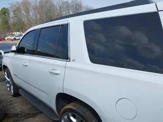 2019 Chevrolet Tahoe LT with VIN 1GNSCBKC6KR345154, listed as a IAAI auction lot 41808536 with 124,325 mi miles. Bid and sale history available at carsss.com. Image 14.