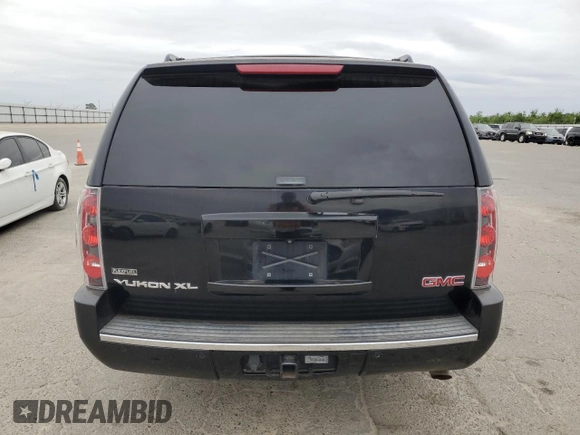 2011 GMC Yukon XL Denali with VIN 1GKS1MEFXBR309715, listed as a Copart auction lot 54693675 with 199,479 mi miles and Clean Title. Bid and sale history available at carsss.com. Image 6.