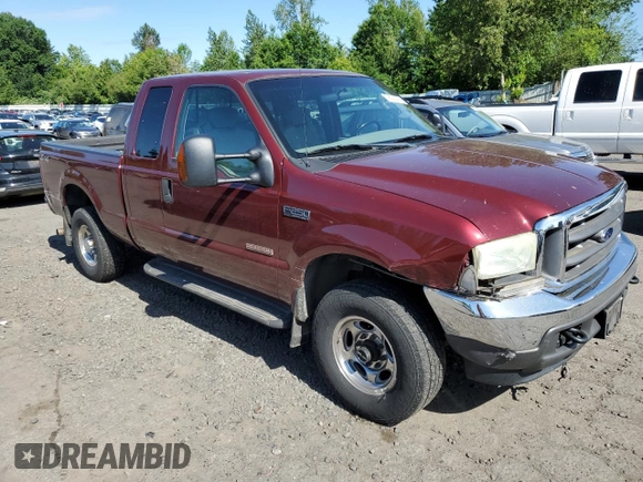 2004 Ford F-250 XL with VIN 1FTNX21P64EB90565, listed as a Copart auction lot 59022005 with 223,577 mi miles and Salvage title. Bid and sale history available at DreamBid. Image 4.