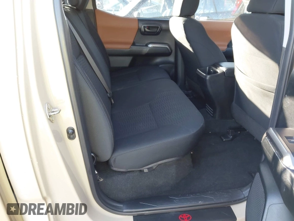 2017 Toyota Tacoma SR5 with VIN 3TMCZ5ANXHM088347, listed as a IAAI auction lot 41591318 with 103,800 mi miles and . Bid and sale history available at DreamBid. Image 8.