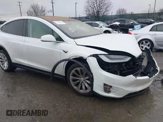 2019 Tesla Model X 75D with VIN 5YJXCDE27KF184980, listed as a IAAI auction lot 41476564 with 125,808 mi miles. Bid and sale history available at carsss.com. Image 1.