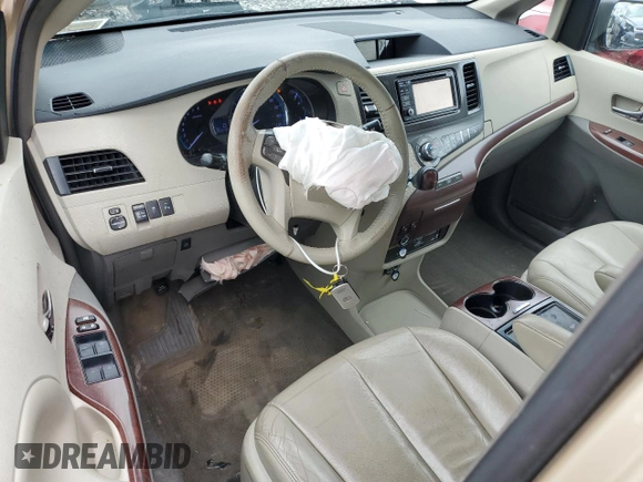 2012 Toyota Sienna XLE with VIN 5TDDK3DC1CS047265, listed as a Copart auction lot 58500275 with 203,548 mi miles and Salvage title. Bid and sale history available at DreamBid. Image 8.