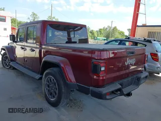 2021 Jeep Gladiator Overland z VIN 1C6HJTFGXML553983, wystawiony jako IAAI lot #41903068 z przebiegiem 54 386 mil mil oraz . Historia ofert i sprzedaży dostępna na DreamBid. Obrazek 3.