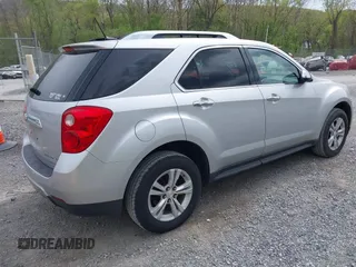2013 Chevrolet Equinox LTZ z VIN 2GNFLGEK3D6165128, wystawiony jako IAAI lot #42085881 z przebiegiem 120 989 mil mil oraz . Historia ofert i sprzedaży dostępna na DreamBid. Obrazek 4.