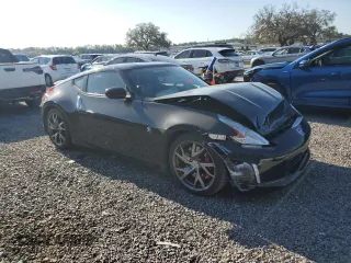 2015 Nissan 370Z Sport with VIN JN1AZ4EH1FM442273, listed as a Copart auction lot 53777595 with 33,248 mi miles and Salvage Title. Bid and sale history available at carsss.com. Image 4.