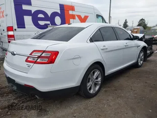 2018 Ford Taurus SEL z VIN 1FAHP2H81JG119145, wystawiony jako IAAI lot #41997302 z przebiegiem 61 467 mil mil oraz . Historia ofert i sprzedaży dostępna na DreamBid. Obrazek 4.