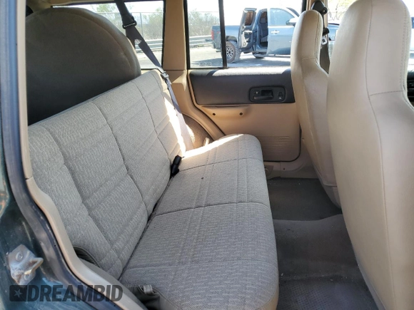 2001 Jeep Cherokee Sport with VIN 1J4FF48S91L610463, listed as a Copart auction lot 59601495 with Not provided miles and Salvage title. Bid and sale history available at DreamBid. Image 11.