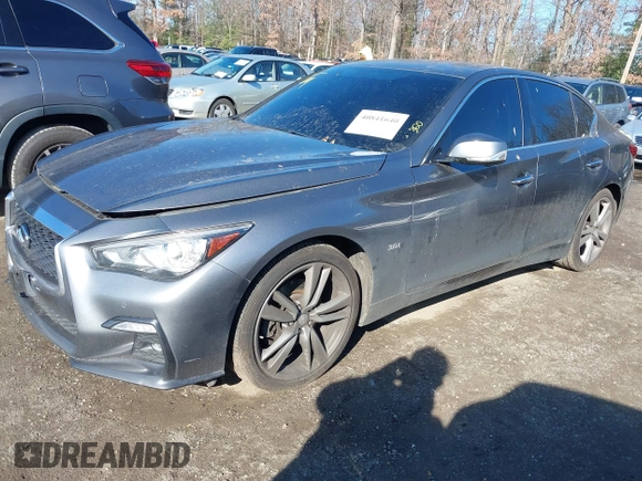2019 Infiniti Q50 Luxe z VIN JN1EV7AR2KM590794, wystawiony jako IAAI lot #40841640 z przebiegiem 68 720 mil mil oraz . Historia ofert i sprzedaży dostępna na DreamBid. Obrazek 18.