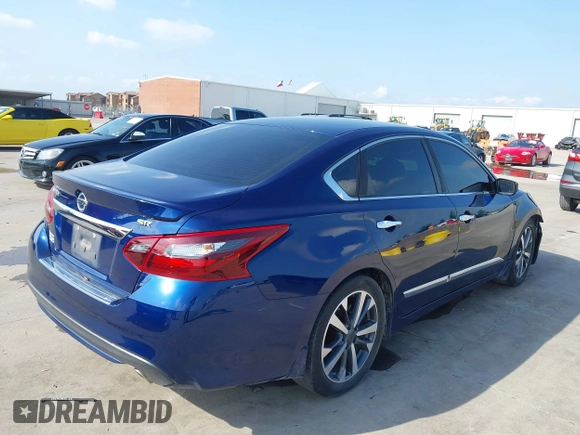 2017 Nissan Altima SV with VIN 1N4AL3AP9HC153145, listed as a IAAI auction lot 42085963 with 157,981 mi miles and . Bid and sale history available at carsss.com. Image 4.