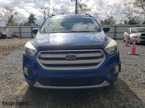 2018 Ford Escape SE with VIN 1FMCU0GD3JUC67441, listed as a Copart auction lot 86274134 with 101,667 mi miles and Salvage Title. Bid and sale history available at carsss.com. Image 5.