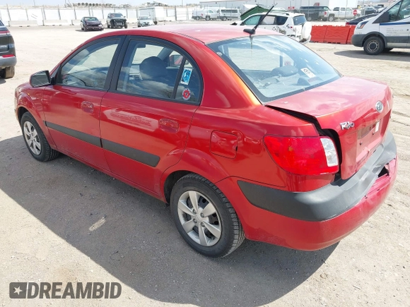 2009 Kia Rio SX with VIN KNADE223396484470, listed as a IAAI auction lot 41964027 with 167,380 mi miles. Bid and sale history available at carsss.com. Image 3.