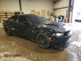 2021 Dodge Charger SRT Hellcat Widebody z VIN 2C3CDXL9XMH617917, wystawiony jako Copart lot #57069205 z przebiegiem 34 859 mil mil oraz Szkoda całkowita • Salvage title. Historia ofert i sprzedaży dostępna na DreamBid. Obrazek 4.