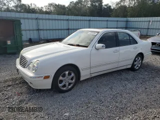 2002 Mercedes-Benz E-Class with VIN WDBJF65J12B434067, listed as a Copart auction lot 74250764 with 102,118 mi miles and Salvage Title. Bid and sale history available at carsss.com. Image 1.