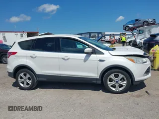 2014 Ford Escape SE with VIN 1FMCU0G93EUD22536, listed as a IAAI auction lot 42045733 with 145,983 mi miles. Bid and sale history available at carsss.com. Image 13.