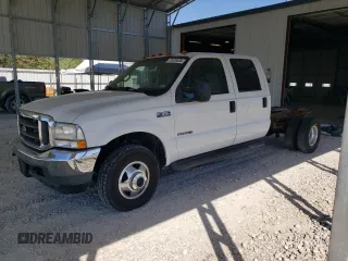 2002 Ford F-350 with VIN 1FDWW37F42EB55737, listed as a Copart auction lot 73678434 with 233,366 mi miles and Salvage title. Bid and sale history available at DreamBid. Image 1.