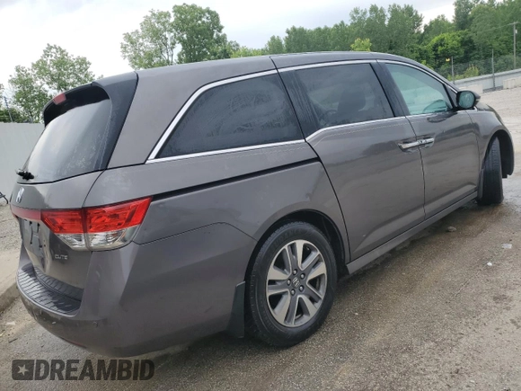 2015 Honda Odyssey Touring Elite with VIN 5FNRL5H95FB117985, listed as a Copart auction lot 57178695 with 199,757 mi miles and Non repairable. Bid and sale history available at DreamBid. Image 3.