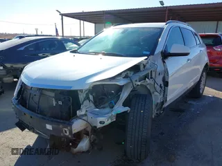 2015 Cadillac SRX with VIN 3GYFNAE34FS557297, listed as a IAAI auction lot 41388573 with 124,185 mi miles and . Bid and sale history available at DreamBid. Image 6.