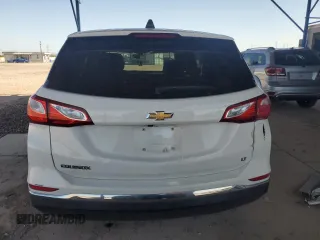 2018 Chevrolet Equinox LT z VIN 2GNAXJEV4J6350418, wystawiony jako Copart lot #56995065 z przebiegiem 49 600 mil mil oraz Szkoda całkowita • Salvage title. Historia ofert i sprzedaży dostępna na DreamBid. Obrazek 6.