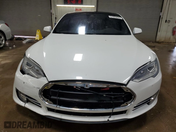 2015 Tesla Model S 85D with VIN 5YJSA1H24FF092628, listed as a Copart auction lot 51959035 with 128,744 mi miles and Salvage Title. Bid and sale history available at carsss.com. Image 5.