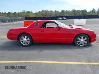 2002 Ford Thunderbird Hardtop Premium with VIN 1FAHP60A02Y130882, listed as a IAAI auction lot 41911737 with 18,521 mi miles and . Bid and sale history available at DreamBid. Image 14.