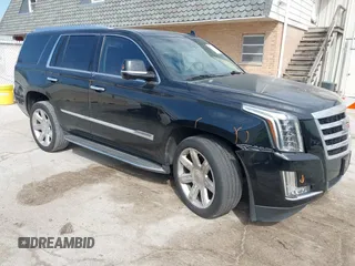 2016 Cadillac Escalade Luxury Collection z VIN 1GYS4BKJ0GR307733, wystawiony jako IAAI lot #41893010 z przebiegiem 136 952 mil mil oraz . Historia ofert i sprzedaży dostępna na DreamBid. Obrazek 1.
