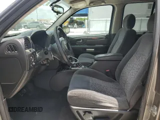 2006 GMC Envoy SLE z VIN 1GKDT13S262271445, wystawiony jako Copart lot #58196195 z przebiegiem 129 902 mil mil oraz Szkoda całkowita • Salvage title. Historia ofert i sprzedaży dostępna na DreamBid. Obrazek 7.
