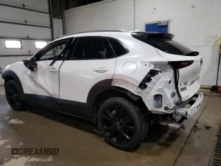 2023 Mazda CX-30 Premium Plus with VIN 3MVDMBEY3PM587798, listed as a Copart auction lot 86524444 with 9,860 mi miles and Salvage title. Bid and sale history available at DreamBid. Image 2.