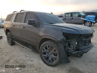 2023 Chevrolet Suburban LT with VIN 1GNSCCKD1PR555635, listed as a Copart auction lot 43834915 with 32,982 mi miles and Salvage Title. Bid and sale history available at DreamBid. Image 4.