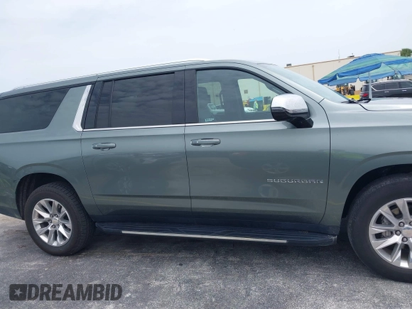 2023 Chevrolet Suburban Premier with VIN 1GNSCFKD2PR377493, listed as a IAAI auction lot 42426988 with 71,365 mi miles and . Bid and sale history available at DreamBid. Image 14.